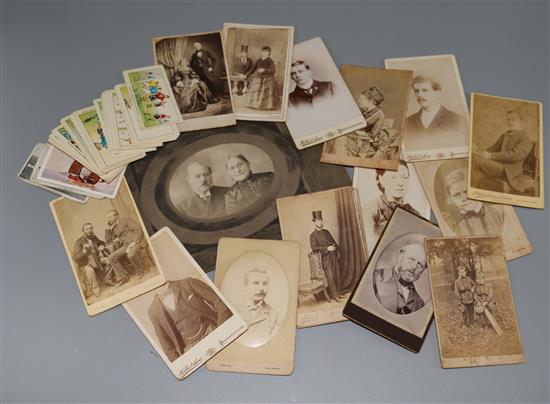 A quantity of postcards and cigarette cards